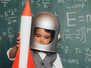 child holding a rocket