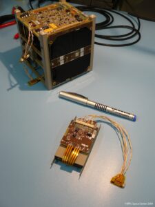 SwissCube and its battery box © EPFL Space Center 2009