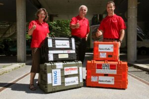 Muriel Richard-Noca, Maurice Borgeaud and Fabien Jordan getting ready to transport SwissCube (and its luggage) © Maurice Borgeaud